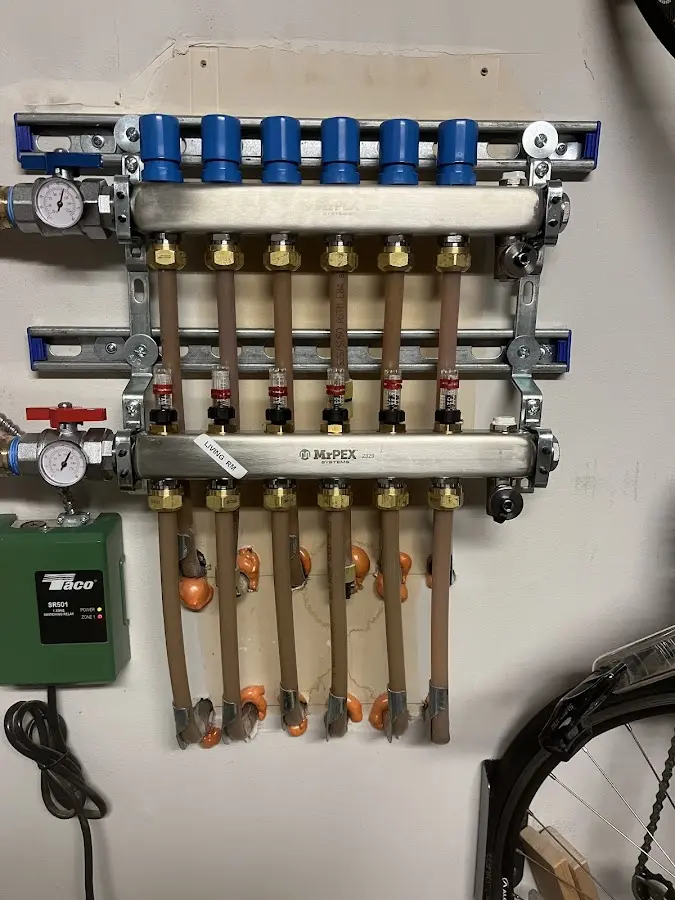 Plumber performing Gas Line Installation at a residential property in Montpelier